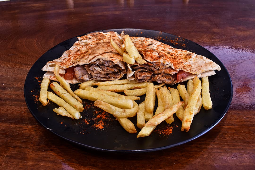 Covered with Gyro pork or chicken