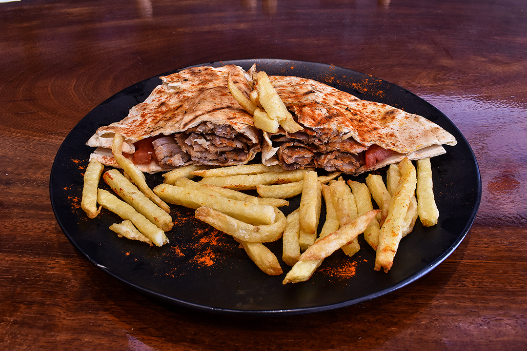 Covered with Gyro pork or chicken